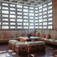 A couch along two walls, and a grid-like window above it